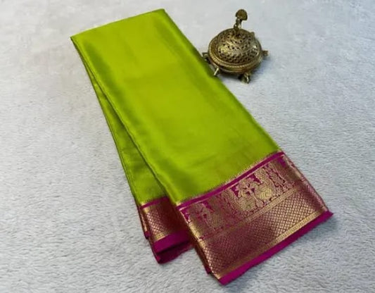 Parrot Green Saree with Pink & Golden Zari Border